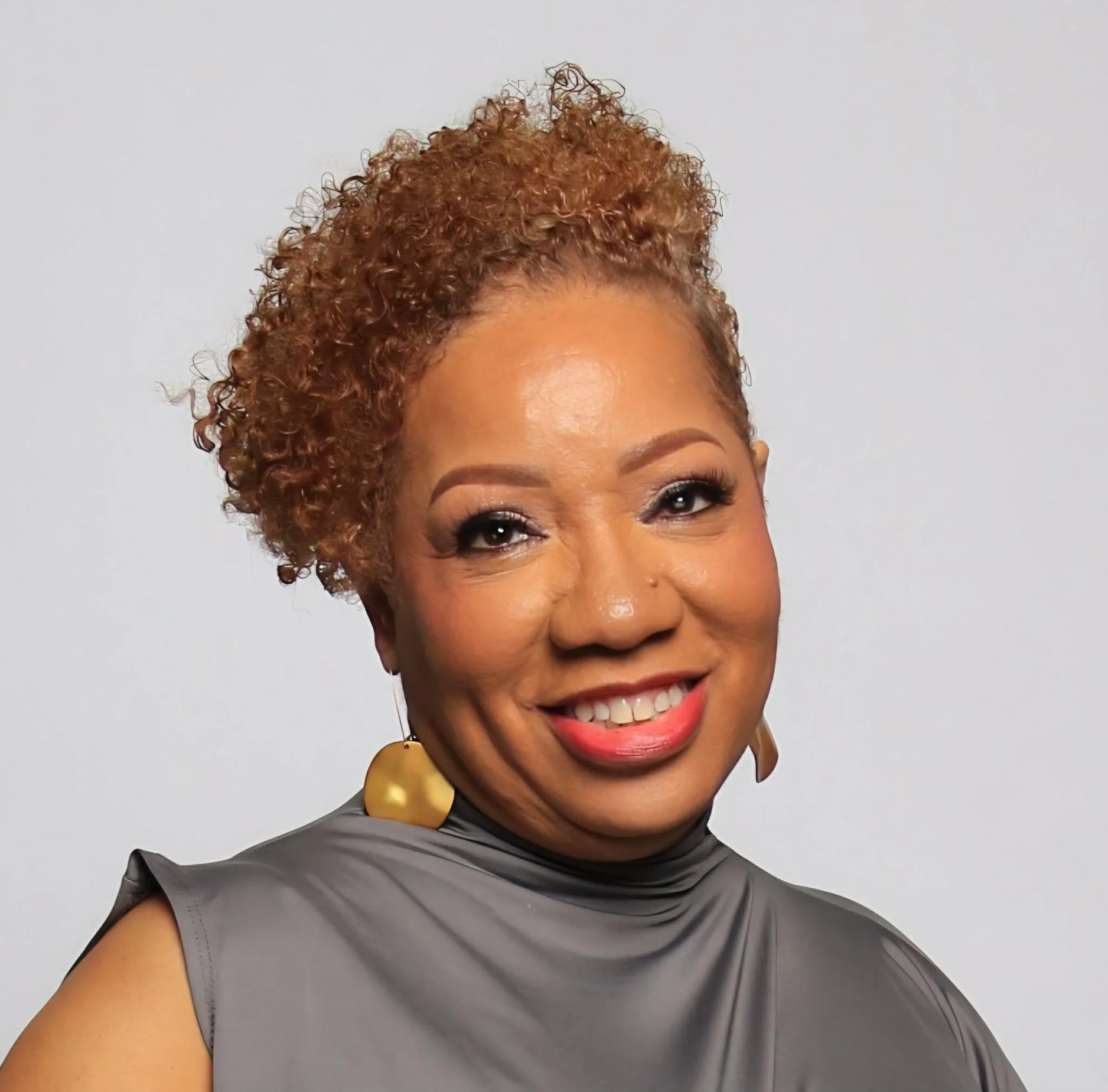 Coach Samantha Hill smiling professional portrait